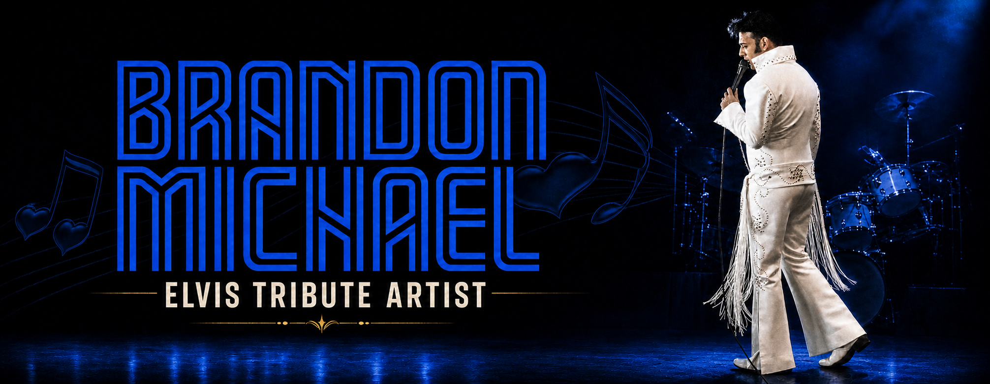Brandon Michael performing on stage in a white jumpsuit